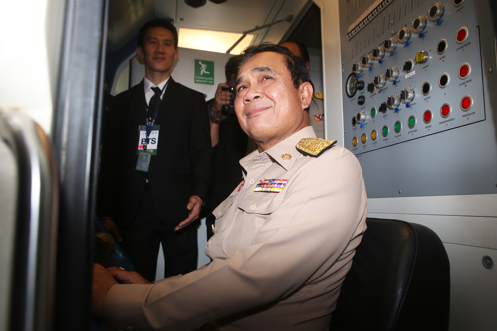 PM Prayuth Chan-ocha at the controls of a BTS train on Monday.