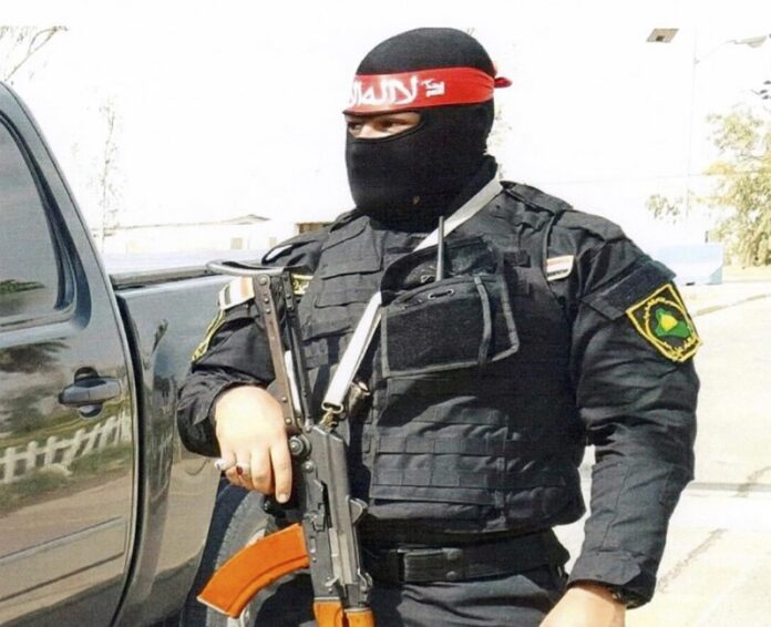 An undated photo shows an Iraqi bodyguard hired by Sallyport Global to protect VIPs. Photo: Associated Press