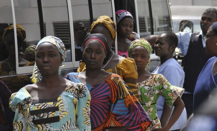 Freed school girls attend a handing over Ceremony ahead of their studies Tuesday in Abuja, Nigeria. Photo: Olamikan Gbemiga / Associated Press