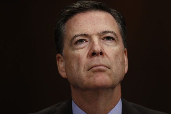 FBI Director James Comey listens on Capitol Hill in Washington on May 3, 2017. Photo: Carolyn Kaster / Associated Press