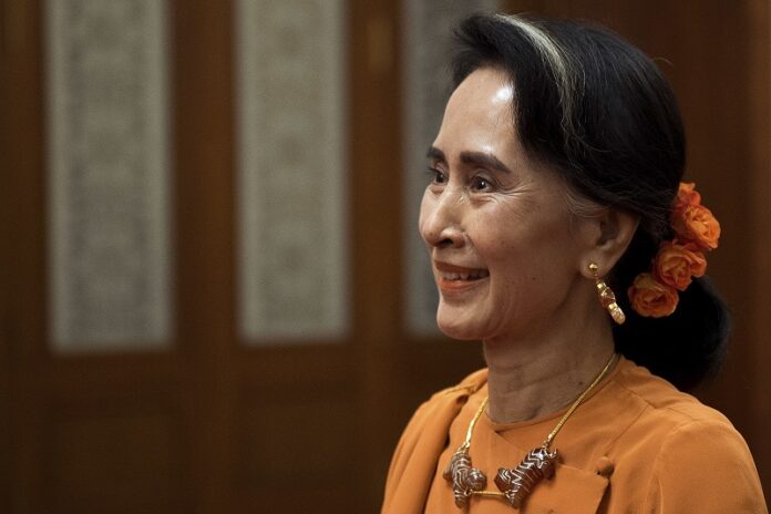 Myanmar State Counsellor Aung San Suu Kyi meets May 16 with Chinese Premier Li Keqiang at the Great Hall of the People in Beijing. Photo: Nicolas Asfouri / Associated Press