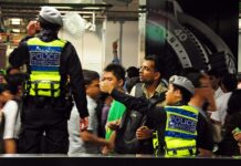 Singapore Arrests 2 Police Over Plan to Join Syria Conflict