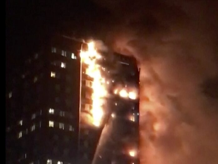 A building is on fire on Wednesday in London, Wednesday. Firefighters are battling a massive fire in an apartment high-rise in London. One side of the building appeared to be in flames. Image: Associated Press