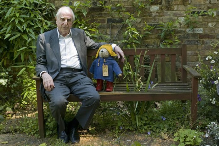 British author Michael Bond sits with a Paddington Bear toy on June 5, 2008, during an interview with The Associated Press in London. Photo: Sang Tan / Associated Press