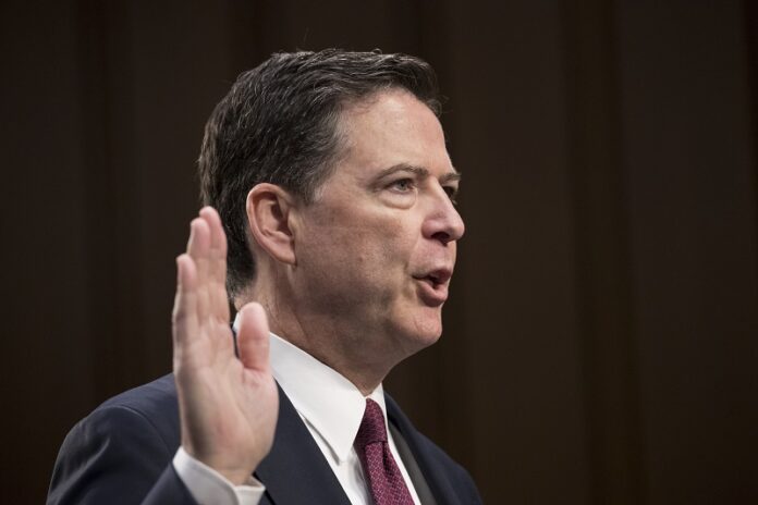 Former FBI director James Comey is sworn in Thursday before the Senate Select Committee on Intelligence on Capitol Hill in Washington. Photo: J. Scott Applewhite / Associated Press