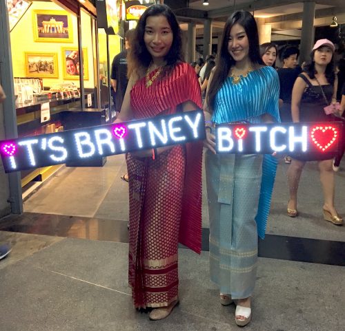 Standing out in traditional Thai costumes were Sunisa Somkhaoyai, at left, and Sulita Aphiphuchayanon. 'I’d like to give Britney an impression of this country. We’re Thai and proud to see her here,' Sunisa said, adding that the idol inspired her to study English and go to the United States, where she saw a few of her shows.