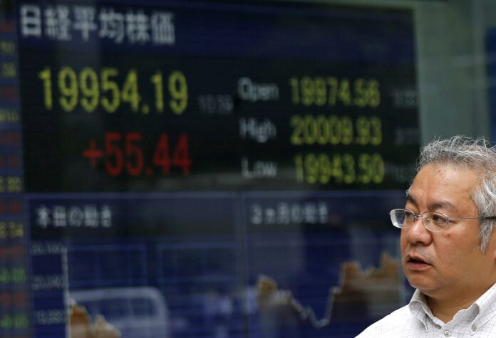 Asian Stocks Fall After IMF Downgrades Economic Outlook