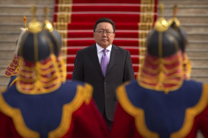 Mongolia's President Tsakhiagiin Elbegdorj inspects an honor guard before a welcome ceremony for South Korea's President Park Geun-hye last year in Ulaanbaatar, Mongolia. Photo: Mark Schiefelbein / Associated Press