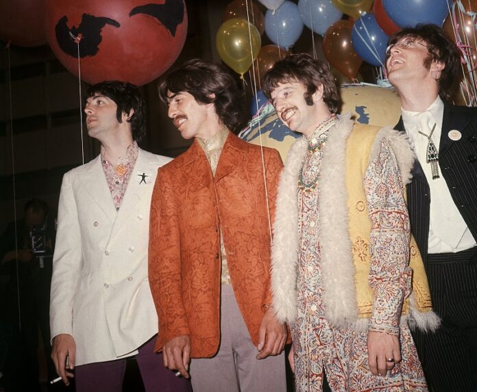 Paul McCartney, from left, George Harrison, Ringo Starr and John Lennon of The Beatles appear backstage during a June 1967 show in London. Photo: Associated Press