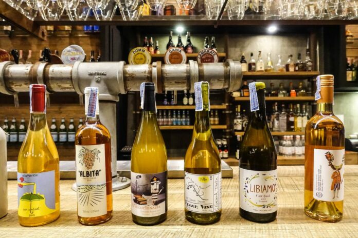 A selection of orange wines available at About Eatery.