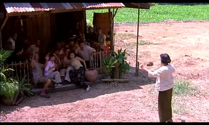 A woman possessed by Phi Pob terrorizes villagers in a scene from “Baan Phi Pob 2008,” the 13th installment of the Baan Phi Pob movies franchise.