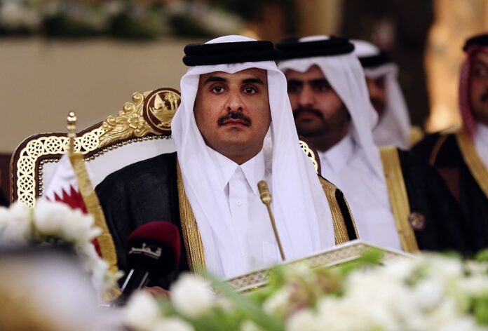 Qatar's Emir Sheikh Tamim bin Hamad Al-Thani attends a Gulf Cooperation Council summit in 2014 in Doha, Qatar. Photo: Osama Faisal / Associated Press