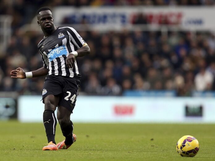 Newcastle United's Cheick Tiote plays the ball forward during their English Premier League soccer match against Chelsea in 2014 at St James' Park, Newcastle, England. Photo: Scott Heppell / Associated Press