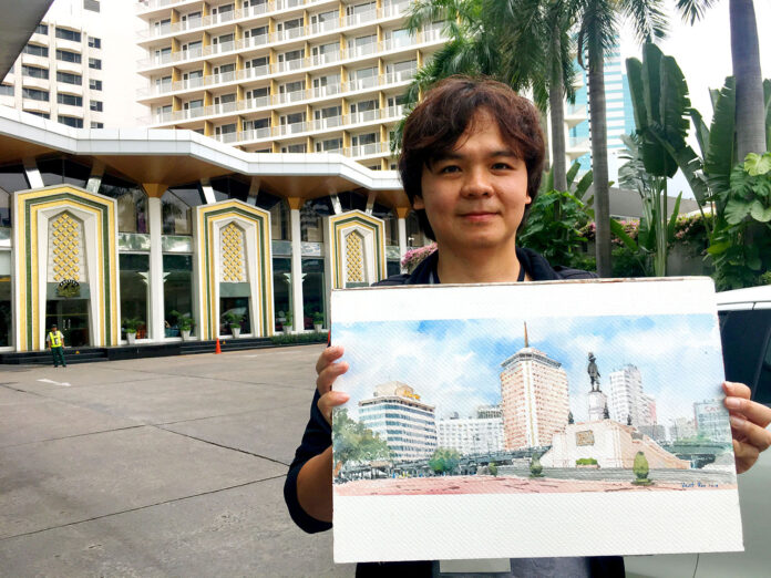 Vamont Ruksiriphong of Bangkok Sketchers shows off his watercolor of the Dusit Thani Hotel at the hotel on Sunday.