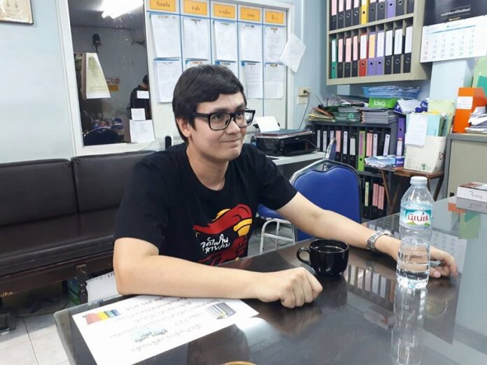 Pro-democracy activist Rangsiman Rome on Sunday afternoon at Bangkok's Chanasongkram Police Station. Photo: Nui Abhisit / Facebook
