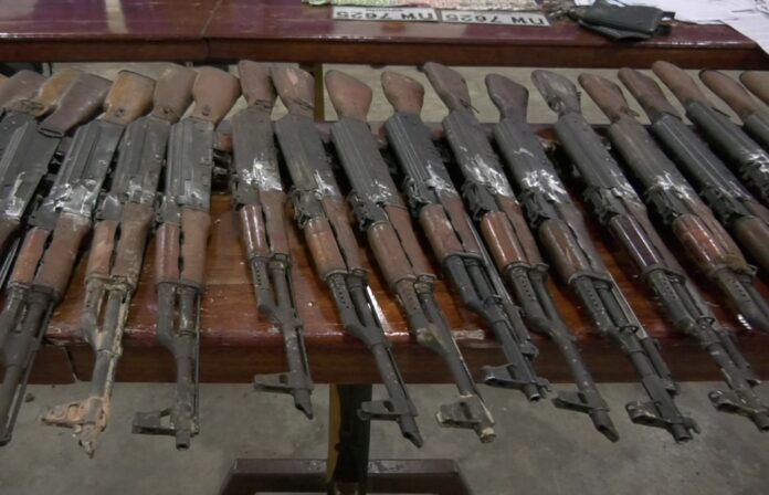 Some of the weapons police said they confiscated from an air force officer in Trat province on Saturday