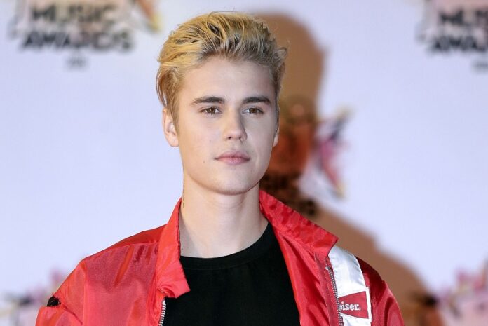 Justin Bieber arrives at the Cannes festival palace in 2015 in Cannes, southeastern France. Photo: Lionel Cironneau / Associated Press