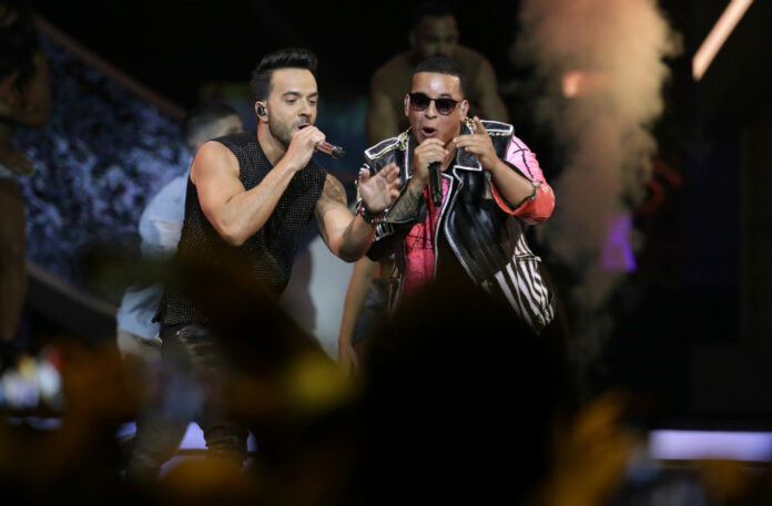 FILE - In this April 27 file photo, singers Luis Fonsi, left and Daddy Yankee perform during the Latin Billboard Awards in Coral Gables, Fla. Photo: Lynne Sladky/ AP.