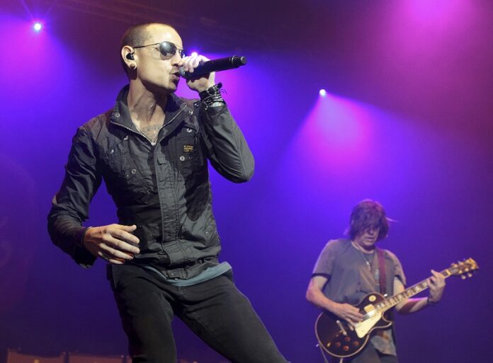 Chester Bennington, left, performs during the MMRBQ Music Festival 2015 at the Susquehanna Bank Center in Camden, New Jersey. Photo: Owen Sweeney / Associated Press