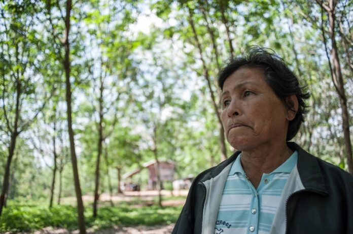 Suphab Kamlae in front of her house in Chaiyaphum province Photo: Matichon