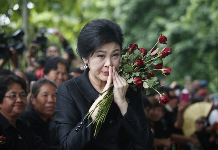 Former Prime Minister Yingluck Shinawatra arrives July 21 at the Supreme Court for the last day of her hearing in Bangkok. Photo: Associated Press