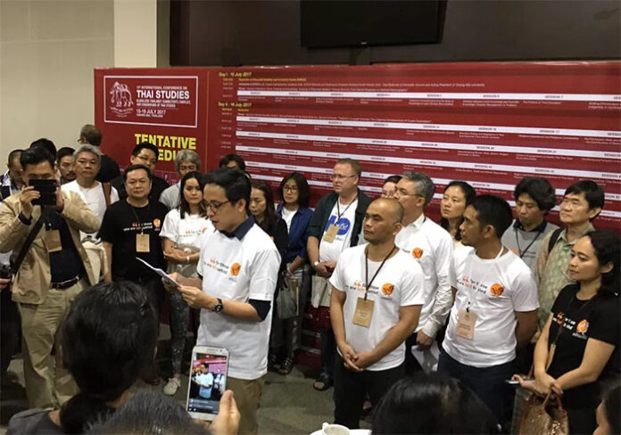 A joint statement calling for academic freedom, freedom of expression and returning power to the people is read July 17 at the 13th International Conference on Thai Studies in Chiang Mai. Photo: Thai Lawyers for Human Rights / Facebook