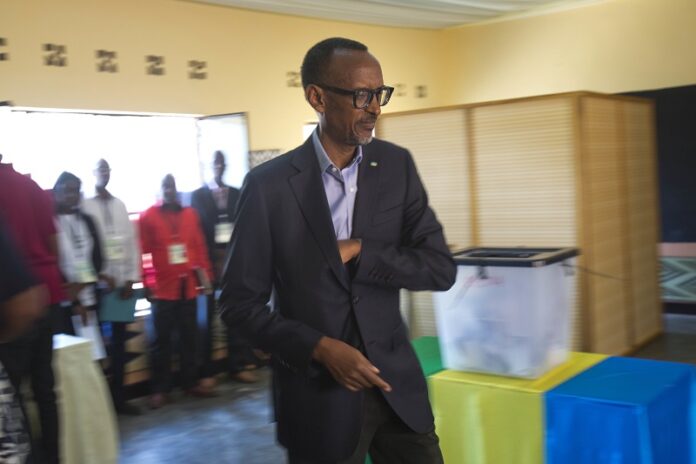 Rwandan President Paul Kagame arrives to cast his ballot Friday in Rwanda's capital Kigali. Photo: Jerome Delay / Associated Press