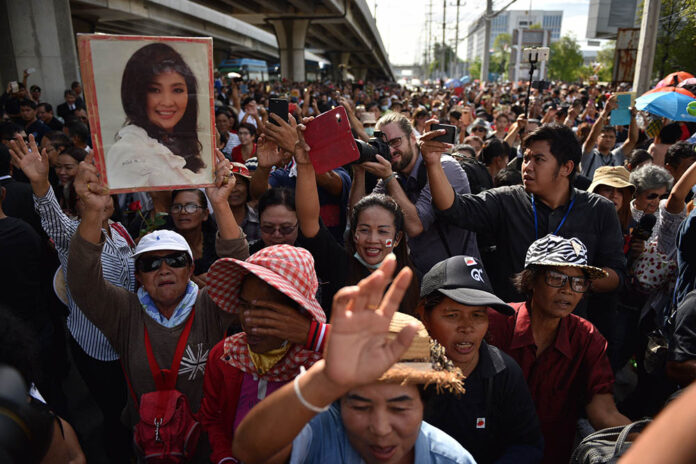Supporters Friday morning outside the Supreme Court building in north Bangkok.