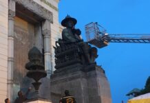 Drunk Man Watches Sunrise From Atop Rama I Statue