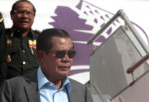 14 Cambodian Opposition Activists Freed From Prison Cambodian Prime Minister Hun Sen, in foreground, exits a plane as his arrives from a trip to Laos at the airport in 2017 in Phnom Penh. Photo: Heng Sinith / Associated Press