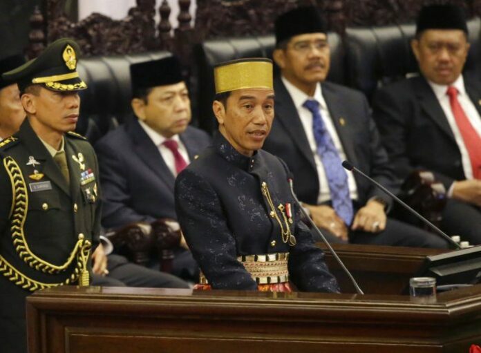 Indonesia's President Joko Widodo, at center, delivers his State of The Nation address in 2017 ahead of the country's Independence Day at the parliament building in Jakarta. Photo: Tatan Syuflana / Associated Press Indonesia's President Joko Widodo, at center, delivers his State of The Nation address in 2017 ahead of the country's Independence Day at the parliament building in Jakarta. Photo: Tatan Syuflana / Associated Press