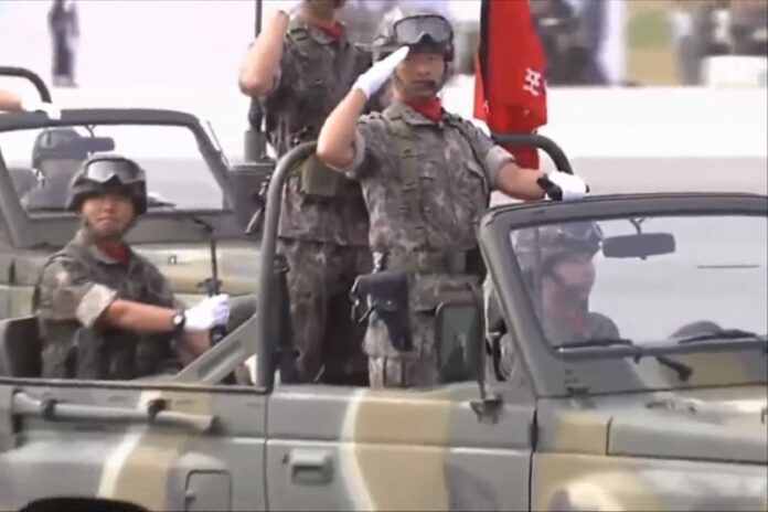 South Korean military officers salute in 2013 during a parade in Seoul, South, Korea. Image: Andy Cruise / YouTube