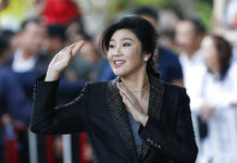 Opinion: Women in Politics, Good Looks and Distractions Former Prime Minister Yingluck Shinawatra waves to supporters as she arrives in 2017 to the Supreme Court to make her final statements in a trial on a charge of criminal negligence. Photo: Sakchai Lalit / Associated Press