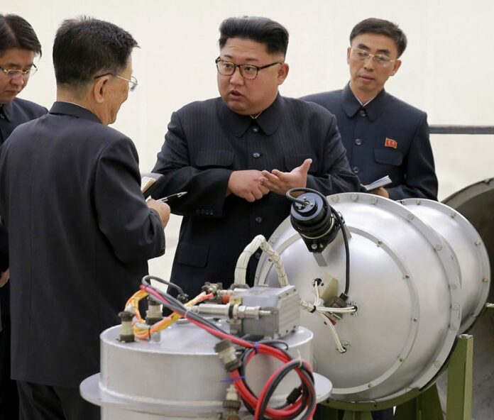 This undated file photo distributed on Sunday, Sept. 3, 2017, by the North Korean government, shows North Korean leader Kim Jong Un, second from right, at an undisclosed location (Korean Central News Agency/Korea News Service via AP, File)