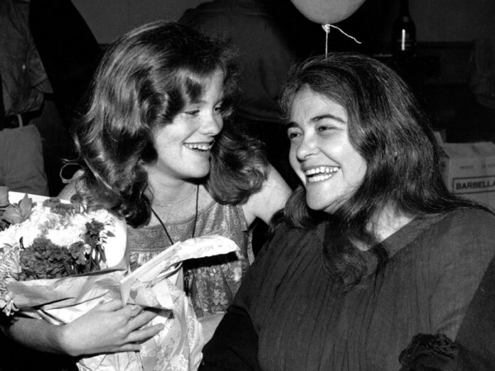Feminist activist Kate Millett, right, laughs, during a surprise birthday party for her niece, Kristan Vigard, in 1979 in New York. Photo: Ron Frehm / Associated Press