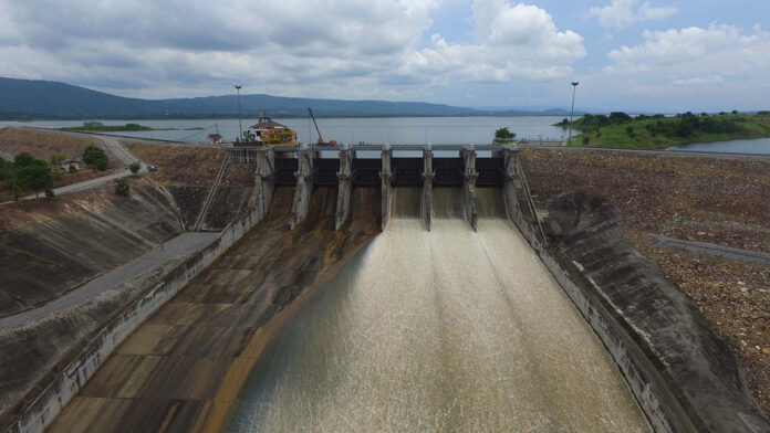 Kaew Noi Bamroong Dan Dam releasing water Friday.