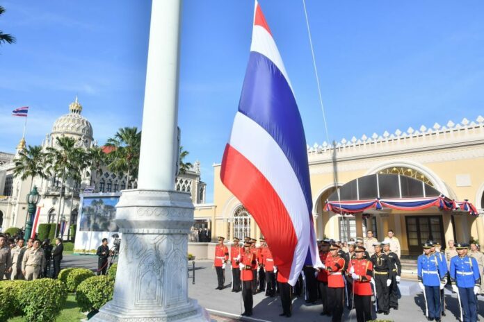 National flag is being raised during a ceremony on Thursday morning at the government house.