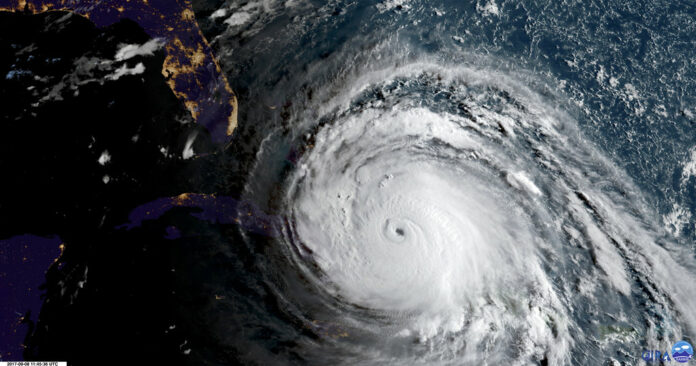 In this geocolor image GOES-16 satellite image taken Friday at 11:45 UTC, sunlight, from the right, illuminates Hurricane Irma as the storm approaches Cuba and Florida. Photo: NOAA