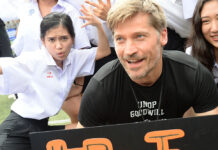 Fan Girls Swarm Kingslayer on Field of Soccer Battle Nikolaj Coster-Waldau of 'Game of Thrones' fame with players on Saturday morning at Bangkok's NIST International School.