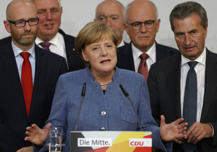 German Chancellor Angela Merkel gives a statement on the parliament election Sunday at the headquarters of the Christian Democratic Union in Berlin. Photo: Michael Sohn / Associated Press