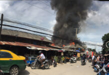 Wood House Fire Fuels Large Column of Smoke
