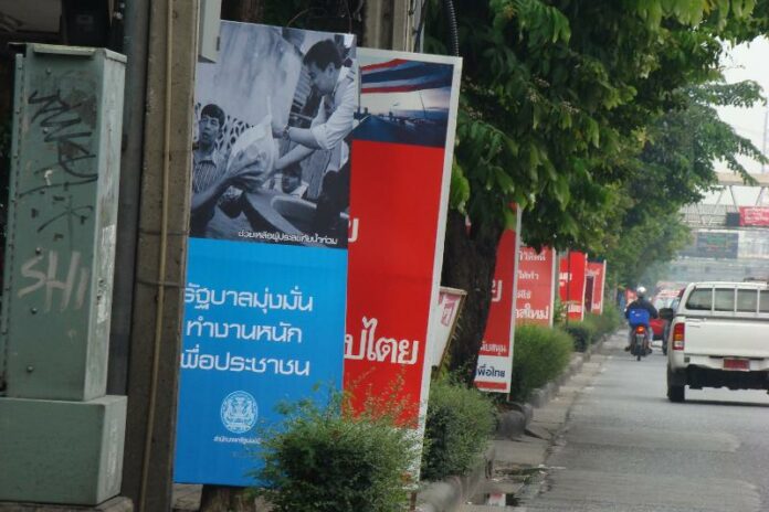 Campaign posters on a Bangkok street in the run-up to the 2011 general election.