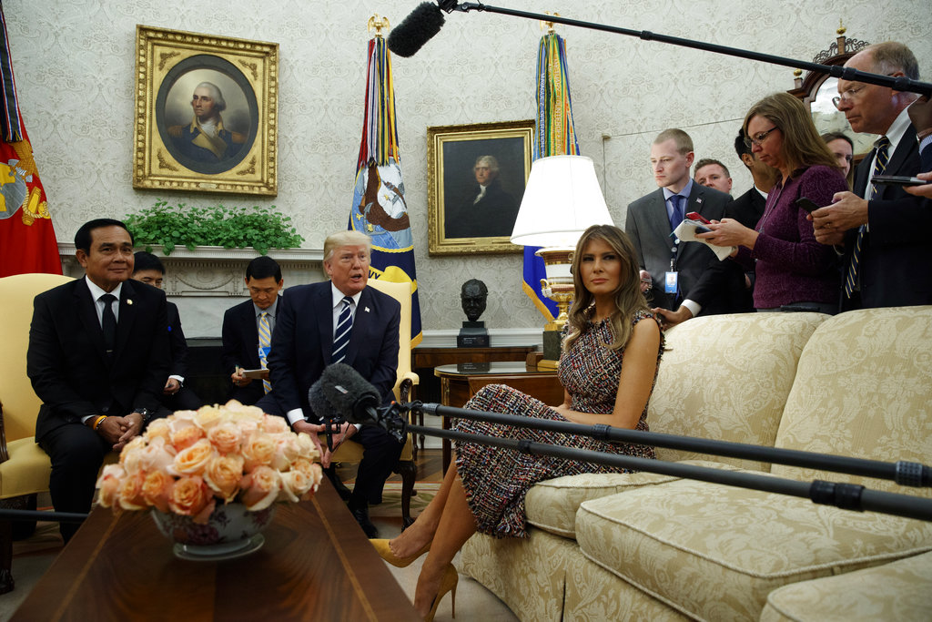 First lady Melania Trump listens as President Donald Trump speaks during a meeting with Thai Prime Minister Prayuth Chan-ocha on Monday in the Oval Office of the White House, President Donald Trump listens as Thai Prime Minister Prayuth Chan-ocha speaks during a Monday meeting in the Oval Office of the White House in Washington. President Donald Trump listens as Thai Prime Minister Prayuth Chan-ocha speaks during a Monday meeting in the Oval Office of the White House in Washington. Photo: Evan Vucci / Associated Press