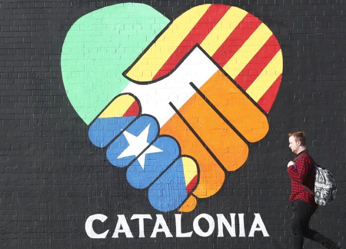 A new pro Catalan independence mural on the Falls Road on Wednesday in Belfast, Northern Ireland. Photo: Niall Carson / Associated Press