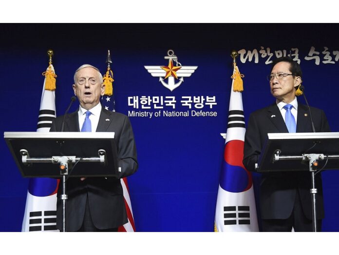 U.S. Secretary of Defense Jim Mattis, left, and South Korea's Defense Minister Song Young-moo hold a joint press conference after the Security Consultative Meeting (SCM) at the Defense Ministry in 2017 in Seoul, South Korea. Photo: Jung Yeon-Je / Associated Press