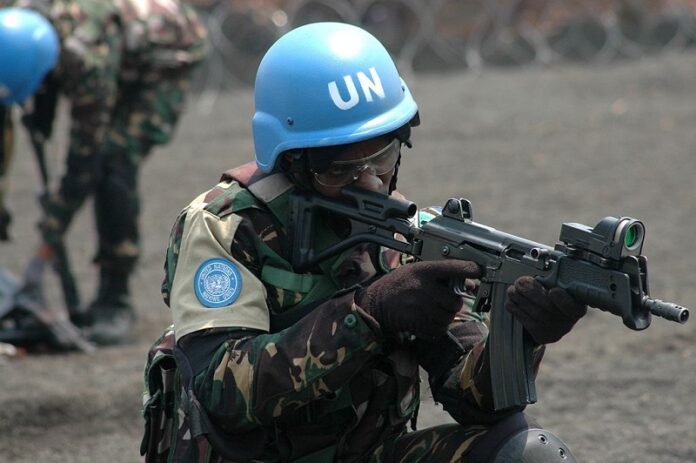 A UN peacekeeper is seen here in 2009 in eastern Democratic Republic of Congo. Photo: MONUSCO Photos / Wikimedia Commons