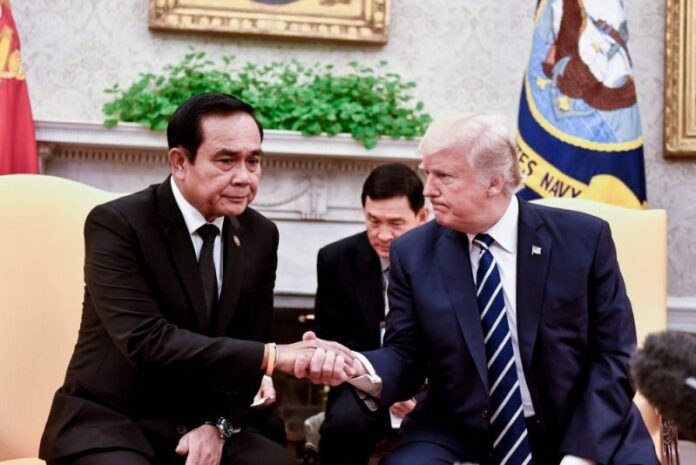 Prime Minister Gen. Prayuth Chan-ocha shakes US President Donald Trump's hand in 2017.