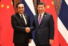 Double Entry, Free Visa Mulled to Boost Falling Chinese Tourism Prime Minister Gen. Prayuth Chan-ocha with Chinese President Xi Jinping on Sept. 4, 2017, at the BRICS summit in Xiamen, China.