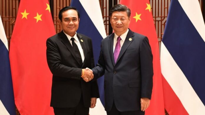 Prime Minister Gen. Prayuth Chan-ocha with Chinese President Xi Jinping on Sept. 4, 2017, at the BRICS summit in Xiamen, China. Prime Minister Gen. Prayuth Chan-ocha with Chinese President Xi Jinping on Sept. 4, 2017, at the BRICS summit in Xiamen, China.