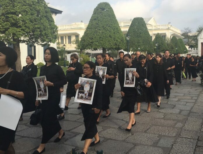 Mourners enter at Bangkok’s Grand Palace on Jan. 12 to pay respect to the late King Bhumibol, whose body was lying in state.